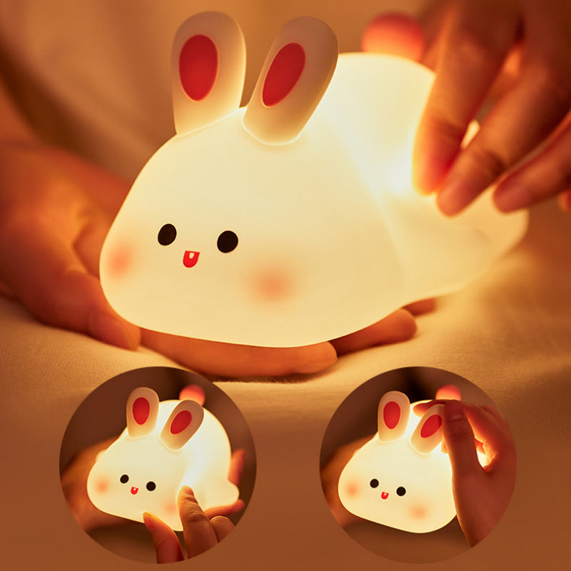 Cute LED Rabbit Night Light – Soft & Cozy Glow for Kids Bring warmth and comfort to any room with this adorable Rabbit LED Night Light. Made from soft silicone and featuring touch-control technology.
